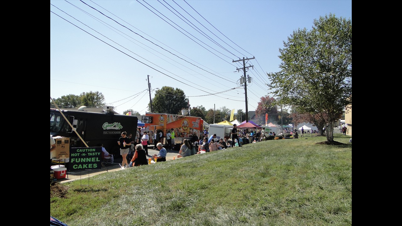 Folks enjoying the Courthouse Lawn.